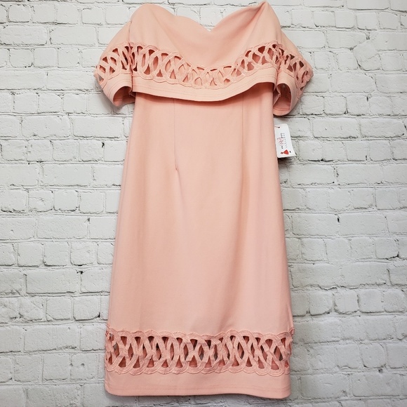 Red Dress Boutique Dresses & Skirts - NWT sweet strapless peach dress